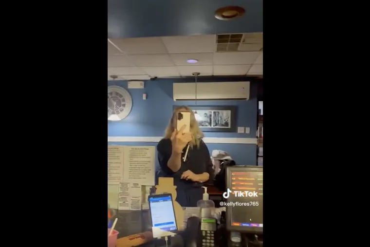 A screenshot of a racist tirade filmed at Amy's Family Pizzeria in Hatboro. Rita Bellew, 56, of Hatboro — who was recorded berating pizza shop staff for playing Spanish-language television — was sentenced to 90 days probation and community service in December 2023.