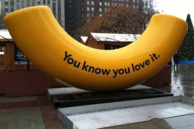 A giant yellow macaroni bearing a message from Kraft was installed in Love Park on Nov. 22, 2011