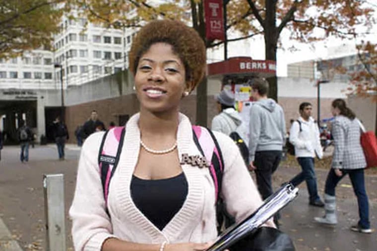 Temple senior Candace Moss found few black students in her honors program but many in leadership roles. "It makes me feel as though we're making our impact," she says. (Ed Hille / Staff Photographer)