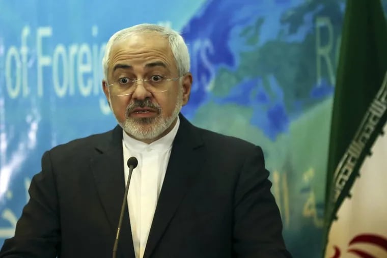 Iranian Foreign Minister Mohammad Javad Zarif speaks at a press conference with his Iraqi counterpart Ibrahim al-Jaafari in Baghdad, Iraq, Tuesday, Feb. 24, 2015. (AP Photo/Khalid Mohammed)