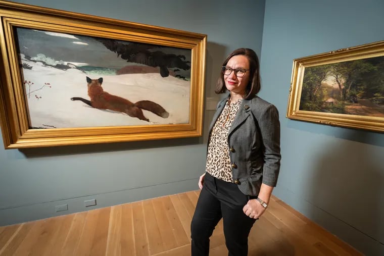Anna O. Marley, PAFA's chief of curatorial affairs, with Winslow Homer's "The Fox Hunt," which many argue is one of the best American paintings ever. The painting is a part of PAFA's new show, which runs through April 2023.