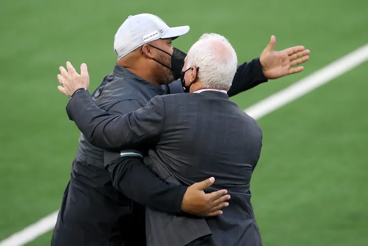 Jeffrey Lurie (right) said that Duce Staley (left) will always be an Eagle, though he is now coaching in Detroit.