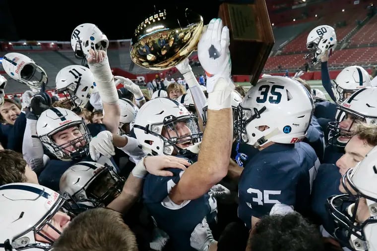 Shawnee High School football players celebrated the Renegades' victory over Hammonton in a regional championship game last December at Rutgers.