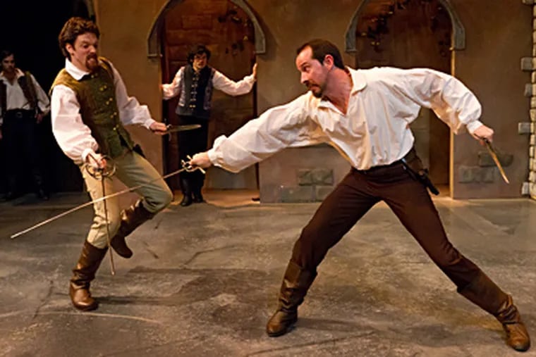 In Lantern Theater Company's “Romeo and Juliet,” swordsmen Jake Blouch (Tybalt) and Charlie DelMarcelle (Mercutio) fight, watched by Sean Lally (Romeo) and Kevin Meehan (Benvolio). (Photo by Mark Garvin)