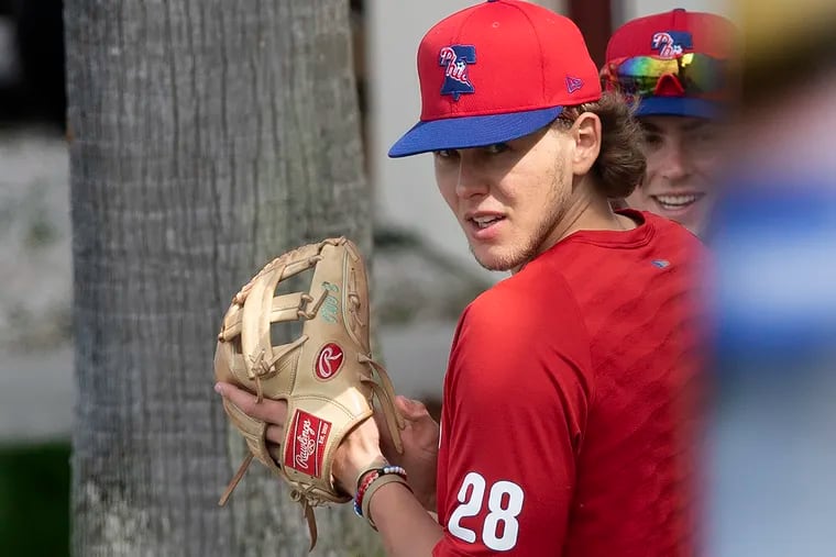 Phillies Alec Bohm looks on during spring training practice at Spectrum Filed in Clearwater, Fla., on Monday.