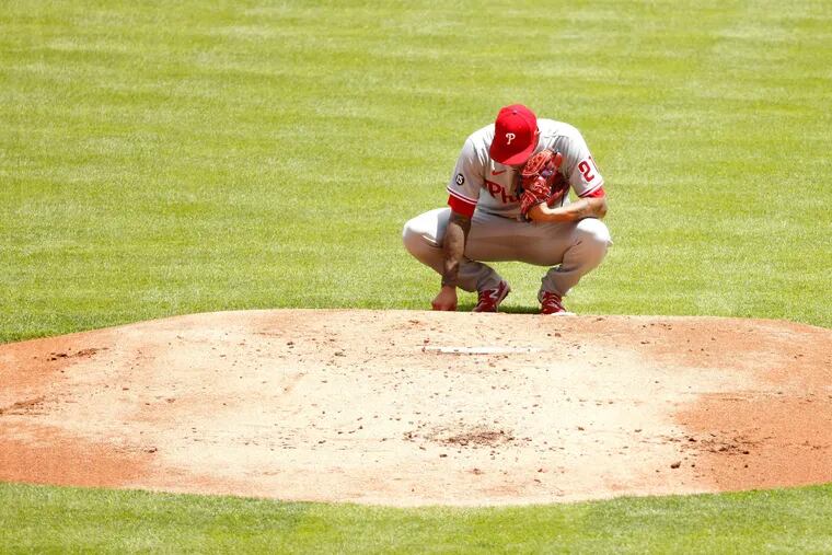 Vince Velasquez of the  Phillies takes a moment before throwing a pitch during the first inning against the Cincinnati Reds at Great American Ball Park.
