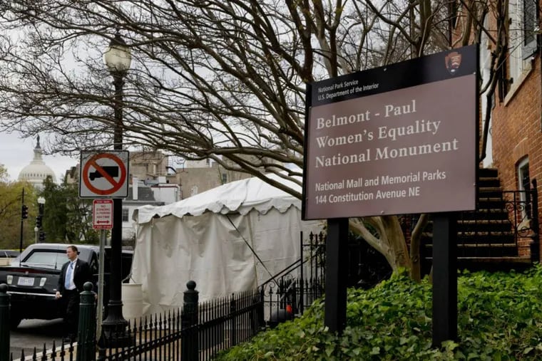 President Barack Obama's limousine sits in front of the newly designated Belmont-Paul Women's Equality National Monument, formerly known as the Sewall-Belmont House and Museum, Tuesday, April 12, 2016, after Obama spoke there on National Equal Pay Day, in Washington.