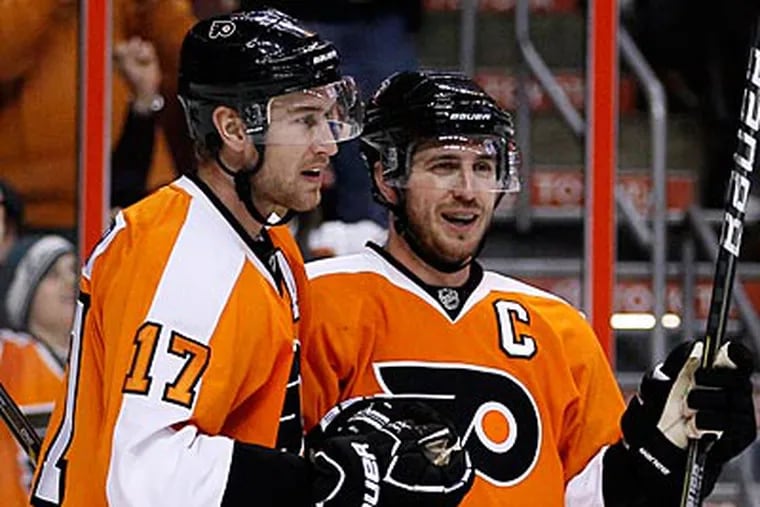 Jeff Carter and Mike Richards have been traded in separate deals. (Matt Slocum/AP Photo)