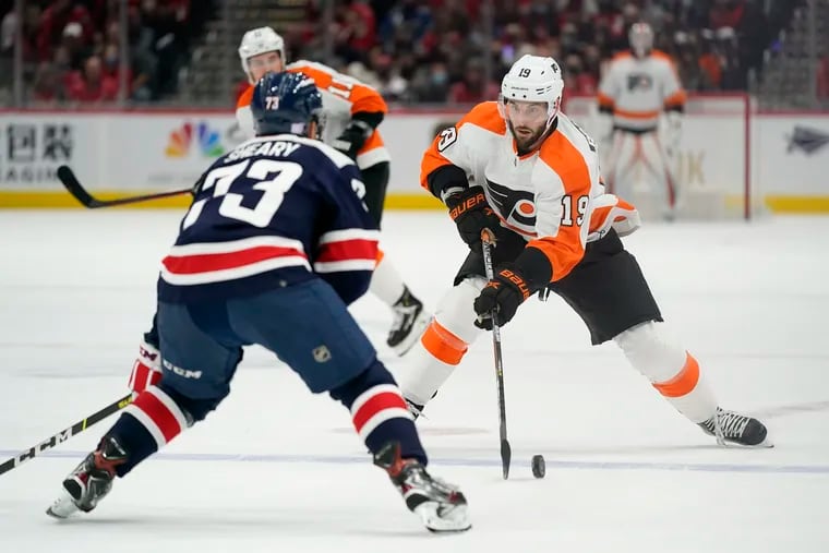 Flyers center Derick Brassard (right) skates with the puck against Washington Capitals left winger Conor Sheary in the first period Saturday. Brassard's goal gave the Flyers a 1-0 lead in the second period.