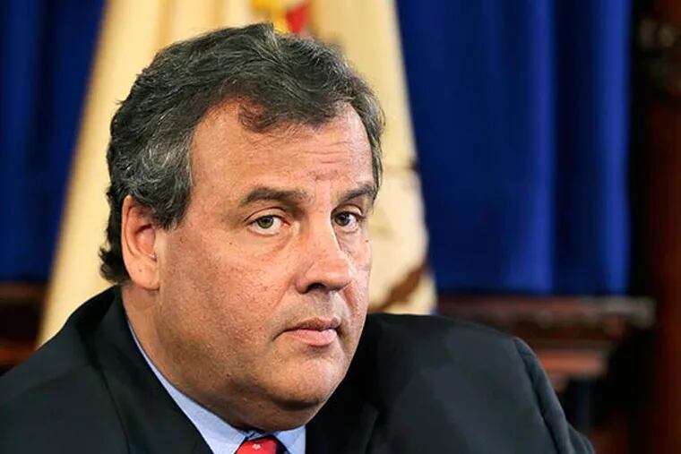 In this Wednesday, Sept. 18, 2013 file photograph, New Jersey Gov. Chris Christie listens to a question in Trenton, N.J. A U.S. senator is launching an investigation into lane closures ordered by Gov. Christie’s appointees at the Port Authority.  (AP Photo/Mel Evans, File)