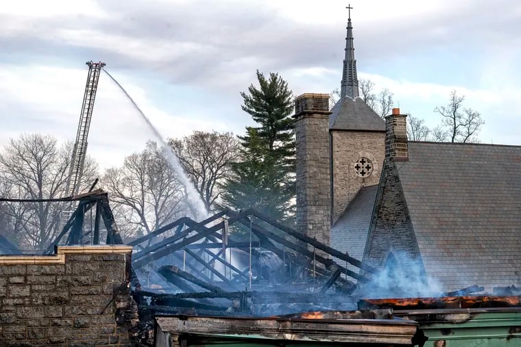 The roof and steeple the Our Mother of Consolation Parish School is destroyed.
