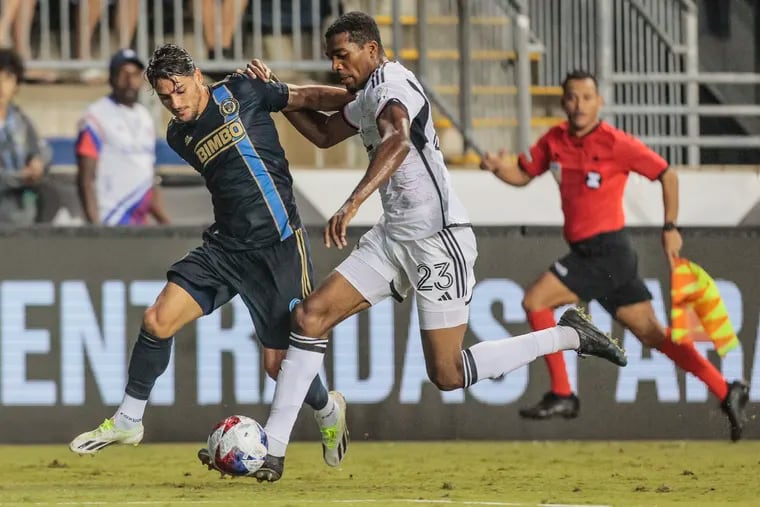 Union's Julián Carranza and DC United's Donovan Pines try for the ball during the first half of Leagues Cup Match at Subaru Park in Chester, Thursday August 3, 2023.