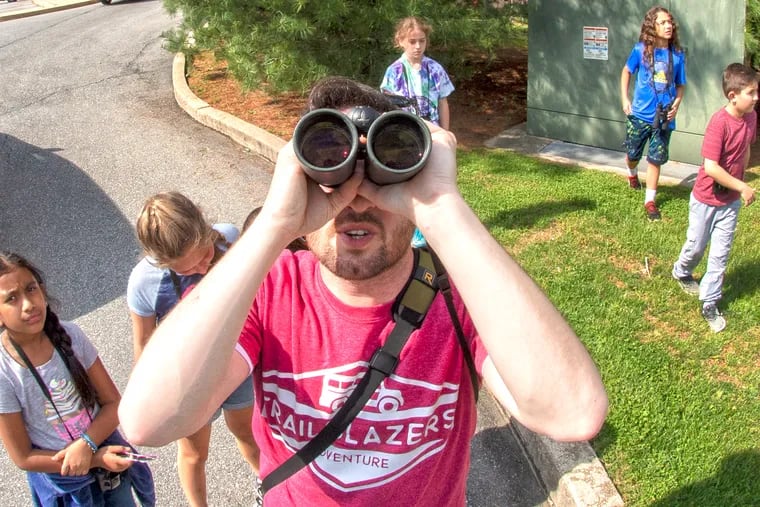 Fifth  grade teacher, Brian Quindlen gathers with his class as they get ready for bird watching at Bethel Springs Elementary in Glen Mills, PA. Wednesday, May 1, 2019.