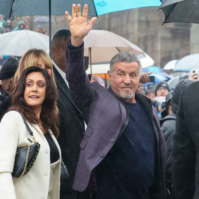 Sylvester Stallone waves to fans at the Philadelphia Museum of Art steps  on Dec. 3, which the City of Philadelphia has declared as Rocky Day.