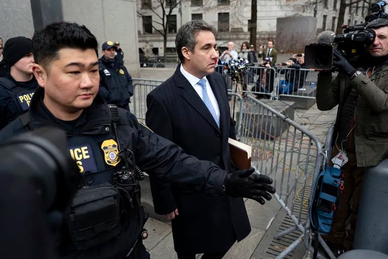 In this Dec. 12, 2018, photo, Michael Cohen, President Donald Trump's former lawyer, leaves federal court after his sentencing in New York. Trump has gone from denying knowledge of any payments to women who claim to have been mistresses to apparent acknowledgement of those hush money settlements – though he claims they wouldn't be illegal.  (AP Photo/Craig Ruttle)