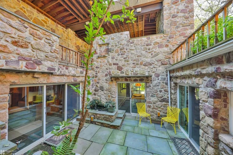 The prairie-style house, which sits adjacent to the Kittatinny Ridge, has plenty of indoor and outdoor living, including this courtyard.