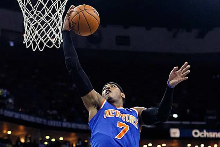 Carmelo Anthony scored 31 points in his return to the lineup, and the host New York Knicks beat the Brooklyn Nets, 100-86. (Gerald Herbert/AP)