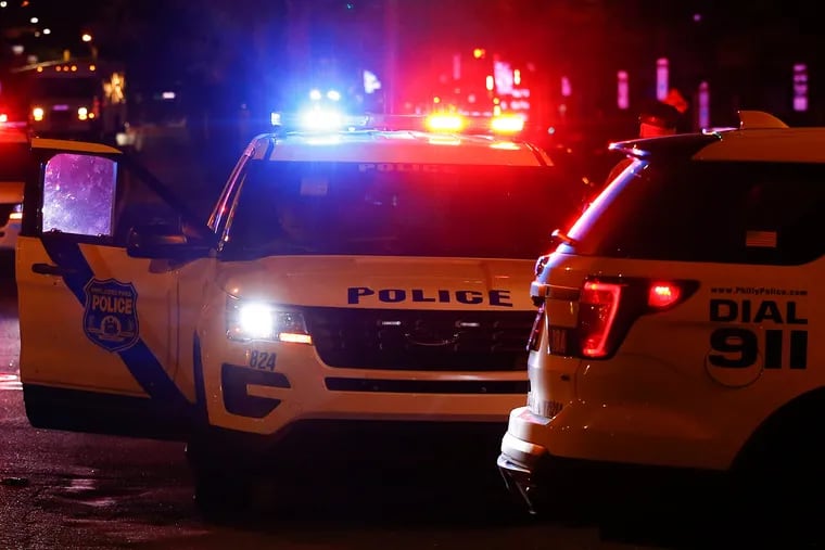 Philadelphia police are investigating a double shooting that left a 35-year-old woman dead and her teenage son critically wounded. The victims were among 15 people shot across the city Monday.