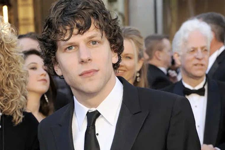 Actor Jesse Eisenberg arrives before the 83rd Academy Awards on Sunday, Feb. 27, 2011, in the Hollywood section of Los Angeles. (AP Photo/Chris Pizzello)