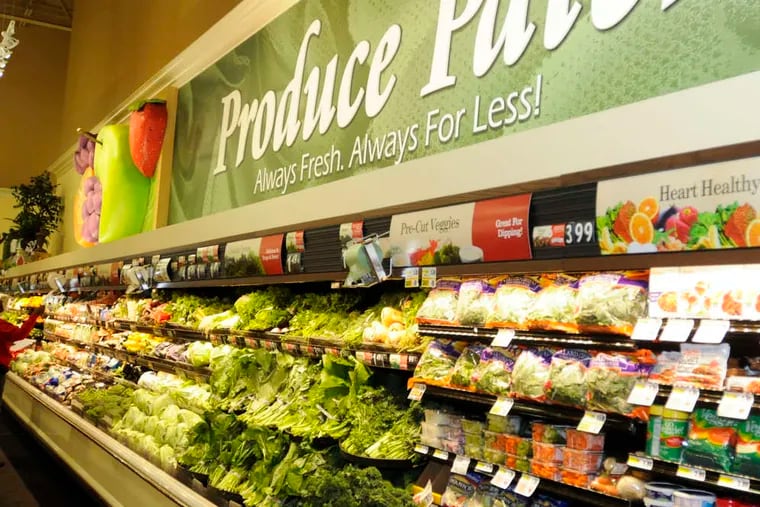 The fresh produce aisle at a supermarket.