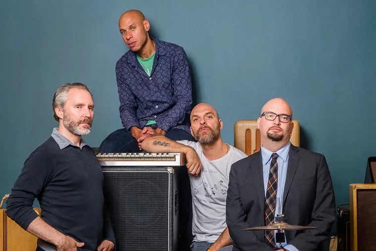 The Bad Plus - (front, from left) bassist Reid Anderson, drummer Dave King, and pianist Ethan Iverson - were joined by saxophonist Joshua Redman (top) on Saturday.
