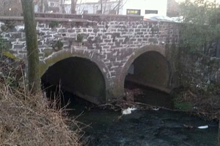 The Centre Avenue Bridge connects Newtown Borough and Newtown Township. PennDot says it needs to be replaced. (Bill Reed / Staff)