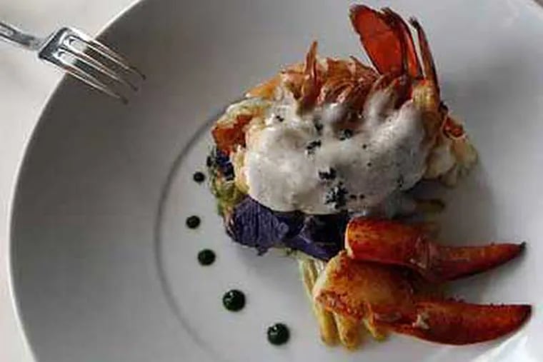 Pan roasted lobster with white asparagus, purple potatoes and truffle mousseline at Maia. (Bonnie Weller/Inquirer)
