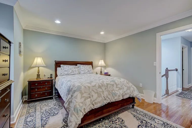 The master suite occupies the entire top floor of the Queen Village rowhouse and includes a spacious bedroom; two closets, including a large walk-in, and a spa-like bathroom.