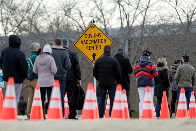 People with appointments still had to wait in long lines at the Gloucester County COVID-19 vaccine site at Rowan College South Jersey in Deptford, N.J., on Jan. 21, 2021.