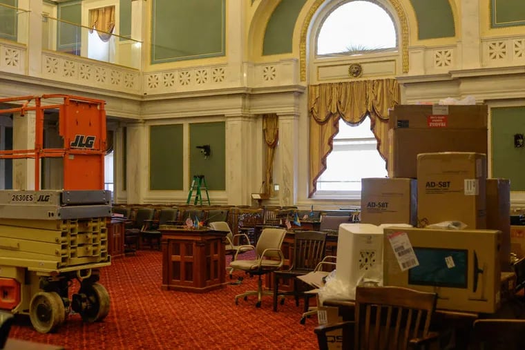 The Philadelphia City Council chamber is shut for the summer, but Council members say they keep working anyhow. Others are not so sure.