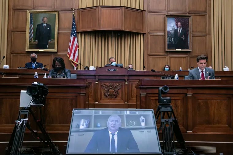In this July 29, 2020, file photo Amazon CEO Jeff Bezos speaks via video conference during a House Judiciary subcommittee hearing on antitrust on Capitol Hill in Washington. A group of House lawmakers put forward a sweeping legislative package that could force Facebook, Google, Amazon or Apple to sever their dominant platforms from their other lines of business.