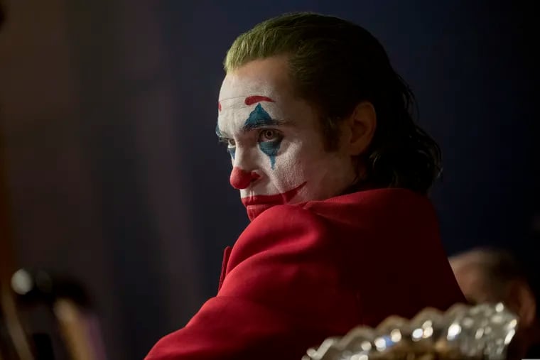This image released by Warner Bros. Pictures shows Joaquin Phoenix in a scene from "Joker," in theaters on Oct. 4. Alarmed by violence depicted in a trailer for the upcoming movie, some relatives of victims of the 2012 Aurora movie theater shooting asked distributor Warner Bros. on Tuesday to commit to gun control causes. Twelve people were killed in the suburban Denver theater during a midnight showing of the Batman film, “The Dark Knight Rises,” also distributed by Warner Bros.