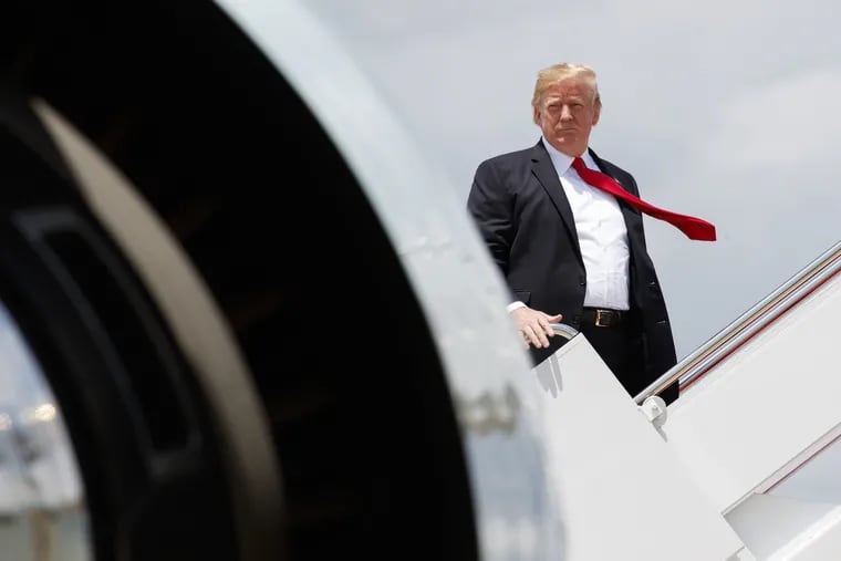 President Trump boards Air Force One at Andrews Air Force Base, Md., en route to a rally in Great Falls, Mont.