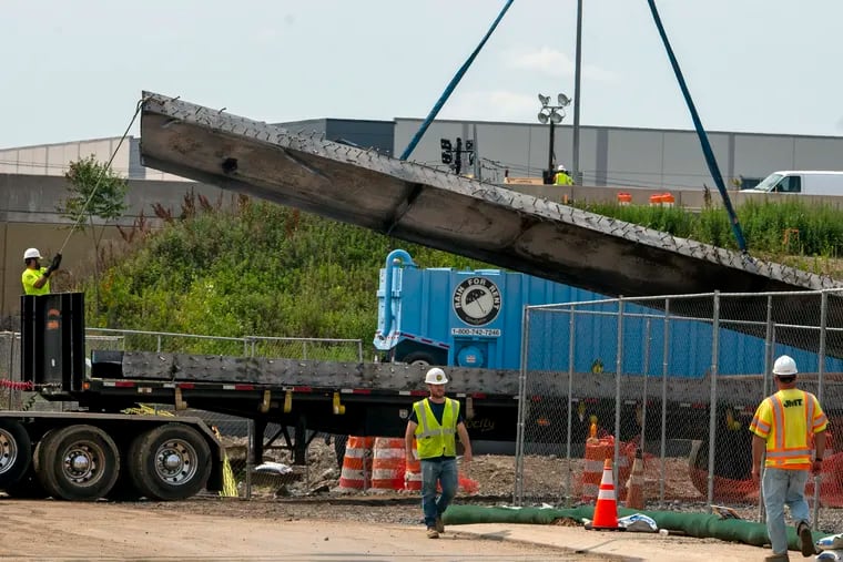 The bridge on I-95 at Cottman Avenue will be rebuilt with 16 new steel I-beams like the one being removed here.
