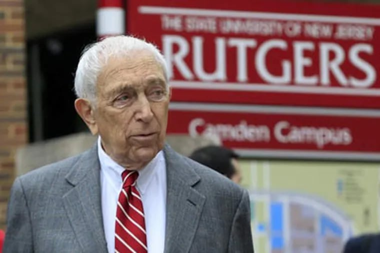 Sen. Frank Lautenberg walks at the Rutgers-Camden campus in Camden on Thursday as he visits to discuss federal low-interest loan rate legislation and take questions on the proposed merger with Rowan University. MEL EVANS / Associated Press