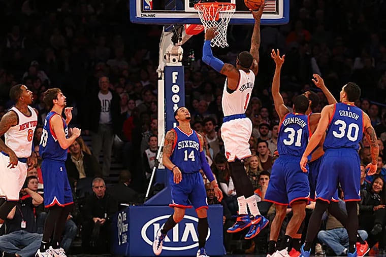 The Knicks' Amar'e Stoudemire dunks the ball over the Sixers' K.J. McDaniels during the second quarter. (Anthony Gruppuso/USA TODAY Sports)