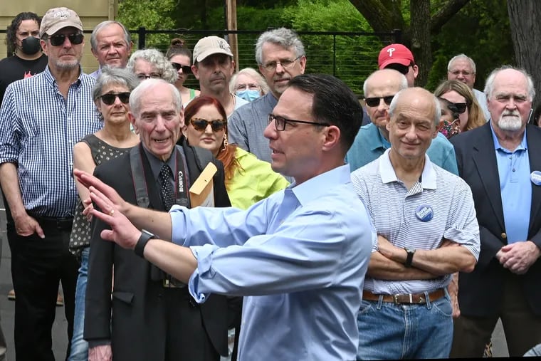 Josh Shapiro, the Democratic candidate for governor, speaks to voters at a rally in Doylestown leading up to the Pennsylvania primary in May. Shapiro, the state attorney general, ran unopposed.