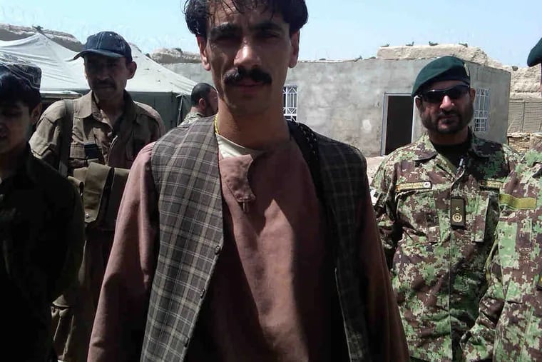 Mohammed Issak, a former police officer , was elected leader of Taben village in Kandahar province. He and his village committee helped the U.S. special forces vet members of the Afghan Local Police. In return, the village got U.S. military help to fund development projects.