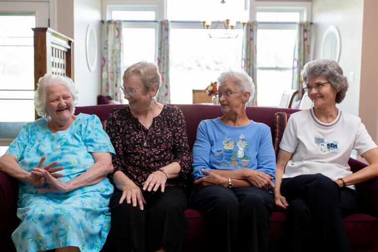 From left, Rose Marie Sheaffer, 78; Ruth Dunlap, 74; Esther Courtney, 70, and Vida Beiler, 74, in their coliving home at Garden Spot Village in New Holland, Lancaster County. The house is for seniors who can live independently. They have their own bed and bathrooms but share all common areas.
