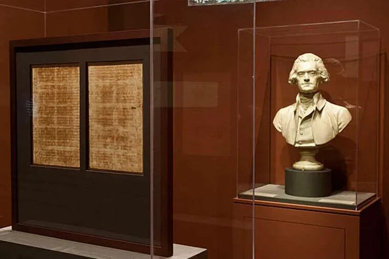 Jefferson's handwritten draft of the Declaration with a bust by Jean-Antoine Houdon on display in the exhibition "Jefferson, Philadelphia, and the Founding of a Nation" at the American Philosophical Society Museum. (RON TARVER / Staff Photographer)