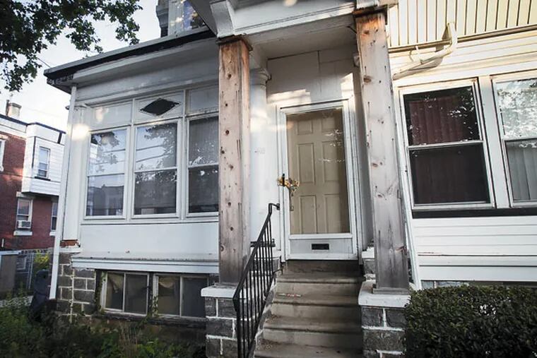 The District Attorney's Office won a ruling allowing the city to seize this house in the 400 block of South 62d St. because the owner's son was charged with selling marijuana out of the house.  (ALEJANDRO A. ALVAREZ/STAFF PHOTOGRAPHER)