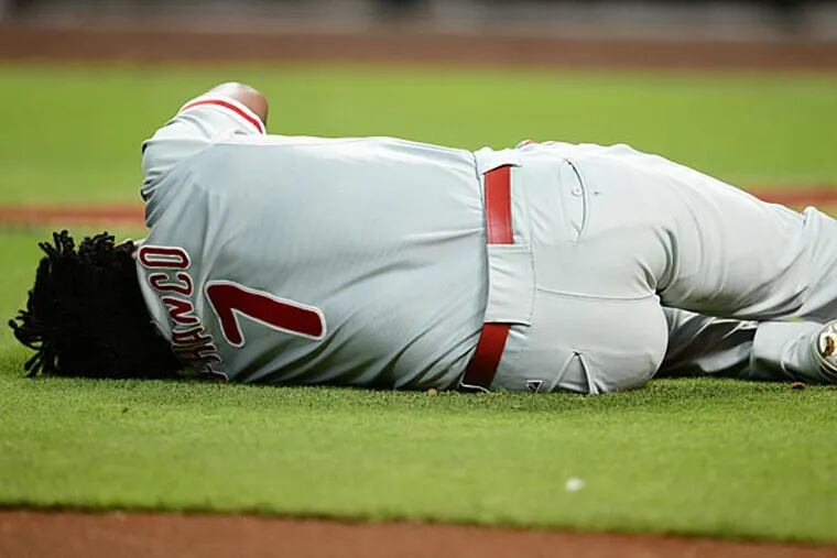 Philadelphia Phillies third baseman Maikel Franco (7) lies on the field after being hit by a pitch against the Arizona Diamondbacks during the first inning at Chase Field. (Joe Camporeale/USA Today)