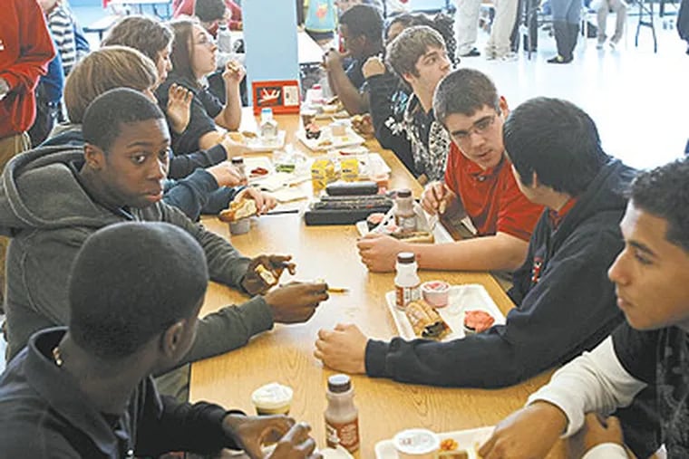 Pennsauken High School students eat lunch in the cafeteria. (MichaelS. Wirtz / Staff Photographer)