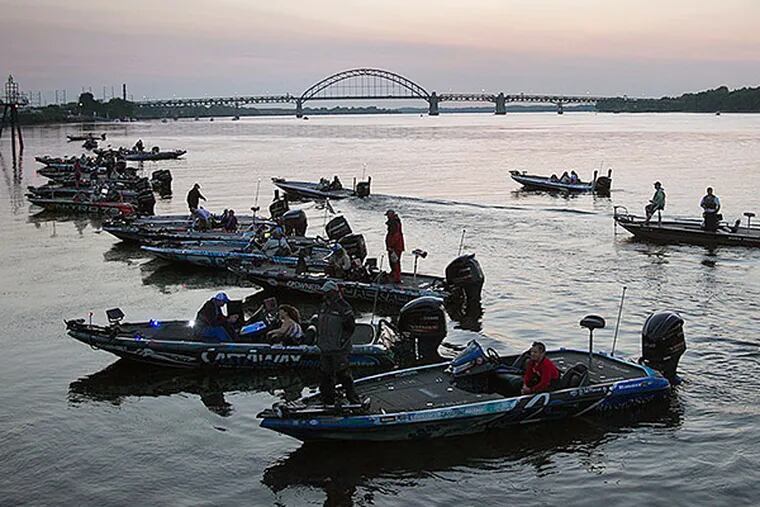 Competitors in the Bass Elite Series tournament on the Delaware River launch their boats at  the Frankford Arsenal Boat Launch Thursday morning.