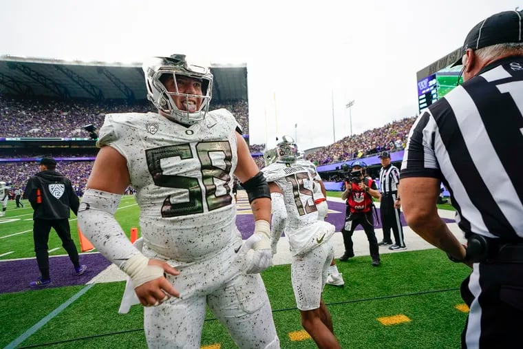 Oregon offensive lineman Jackson Powers-Johnson reacts after a two-point conversion against Washington on Oct. 14.