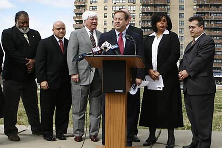 Freeholder Director Louis Cappelli Jr. speaks at a news conference in which local officials called for a federal probe into conditions at the Northgate I apartment building. (Eric Mencher/Staff Photographer)