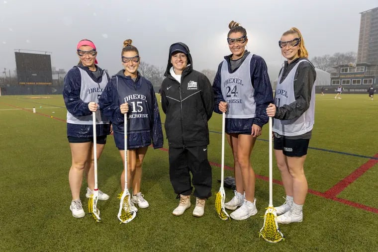 First-year Drexel lacrosse coach Kim Hillier (center) with (from left) Colleen Grady, Maura Cissell, Grace Harding, and Karson Harris.