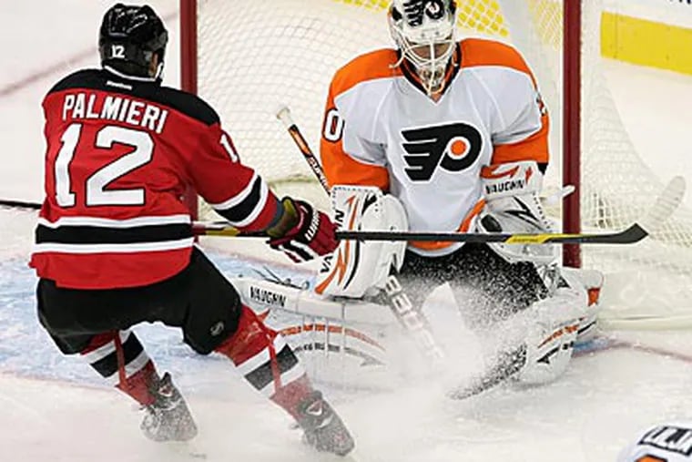 Ilya Bryzgalov made 18 saves in the Flyers' 2-1 loss to the Devils. (Rich Schultz/AP)