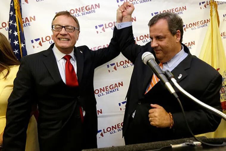 Gov. Christie (right) and Steve Lonegan during a news conference at which Christie announced his endorsement of Lonegan's bid for the U.S. Senate. (AP Photo / Julio Cortez)