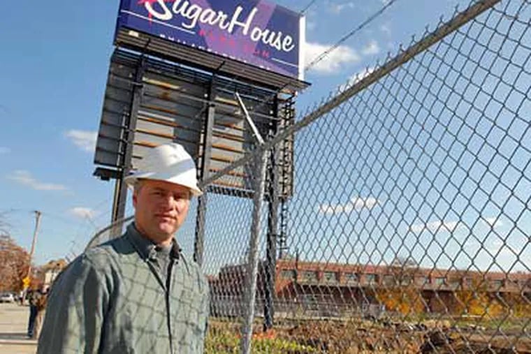 Torben Jenk stands outside the site of the Sugarhouse casino construction where he is part of a survey of Batchelor's Hall, a natural science and philosophical society for Quaker gentlemen. (Ron Tarver/ Staff Photograper)